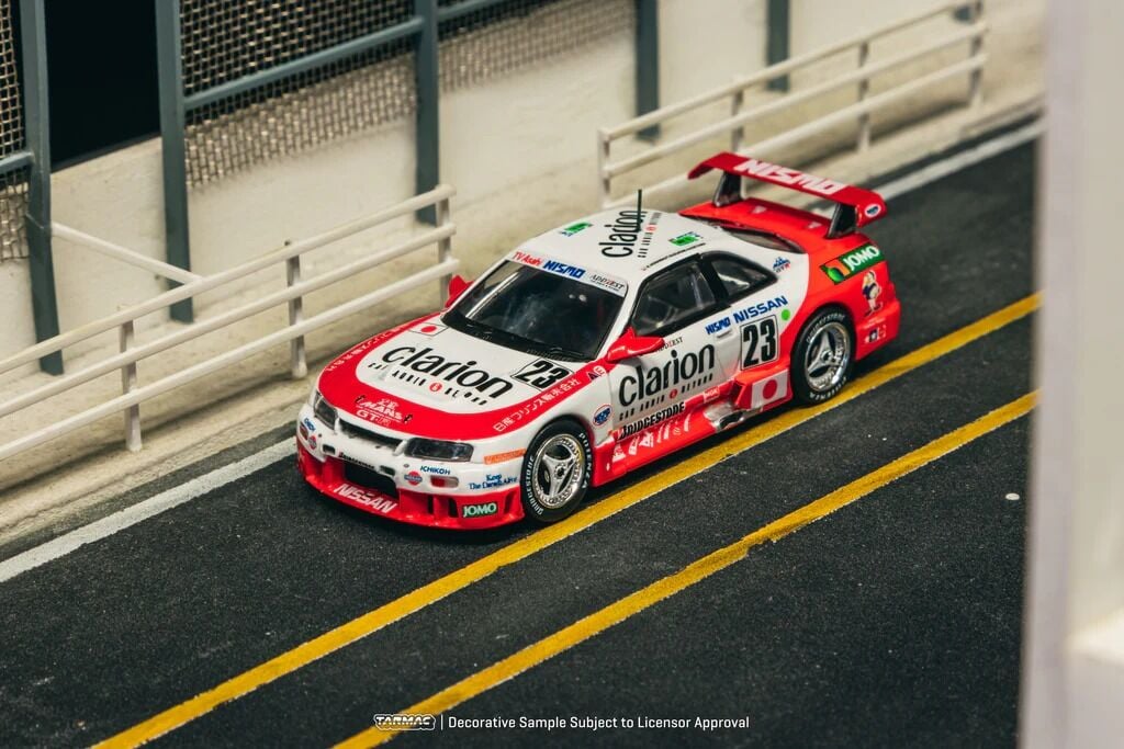 Tarmac Works 1/64 Nissan NISMO GT-R LM 24h of Le Mans 1995 Presentation #23 - HOBBY64