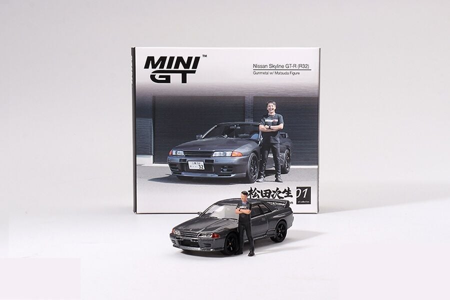 Mini GT 1/64 869 Nissan Skyline GT-R (R32) Gunmetal W/ Matsuda Figure Tsugio Matsuda Collection