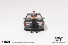 Mini GT 1/64 869 Nissan Skyline GT-R (R32) Gunmetal W/ Matsuda Figure Tsugio Matsuda Collection